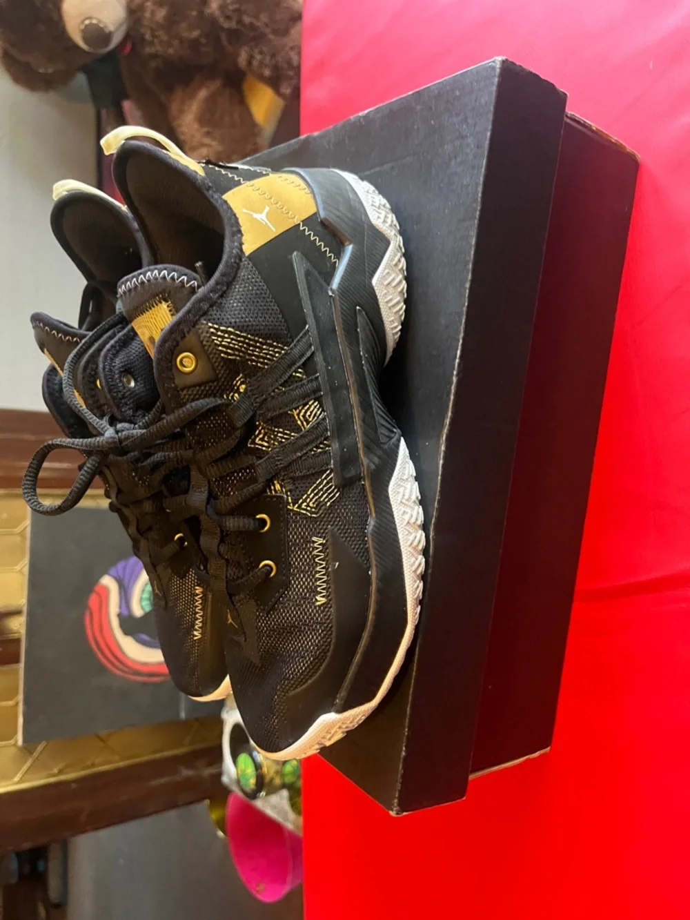 Jordan Black and Gold Youth Basketball Sneakers